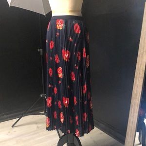 Babaton pleated floral skirt “Jude” starboard red